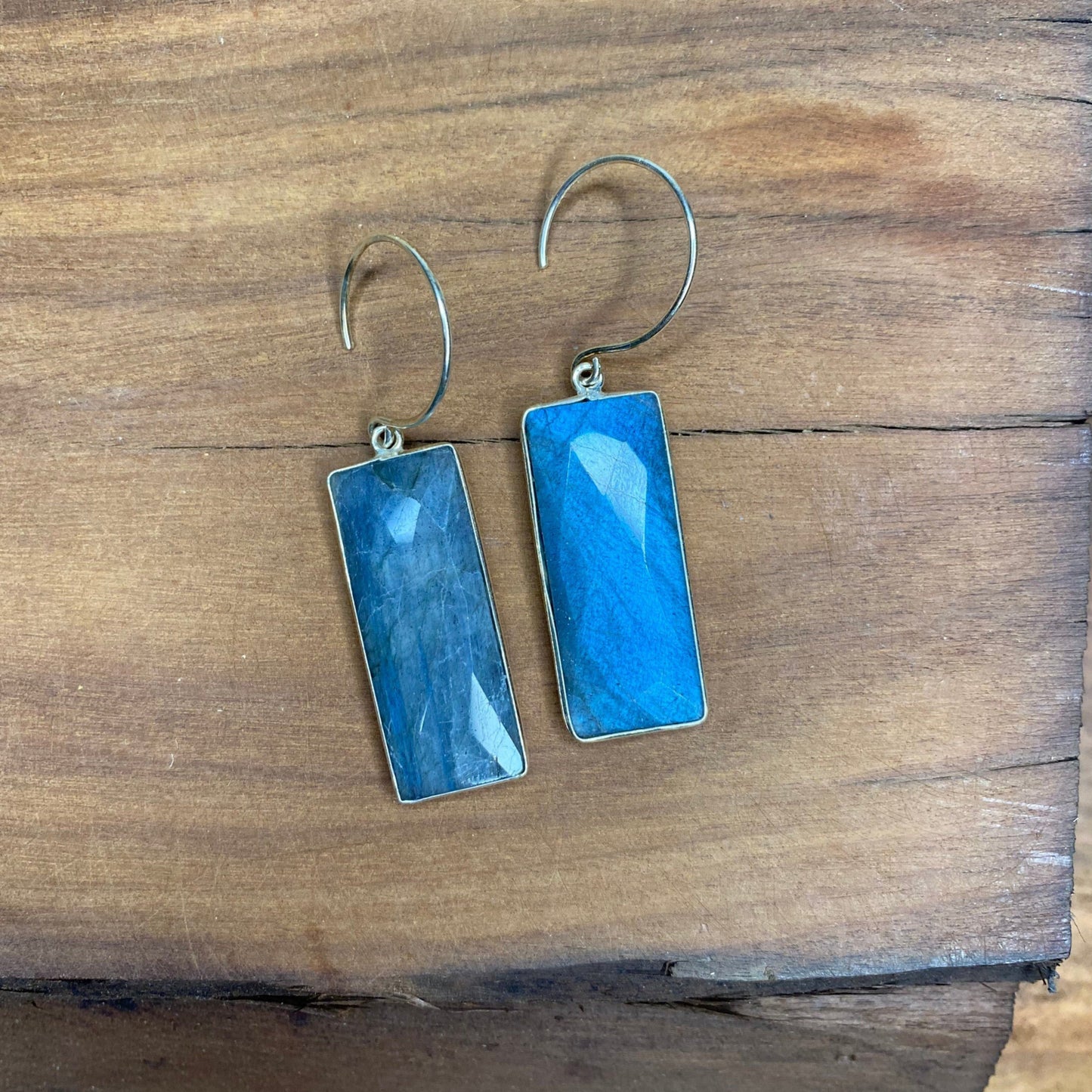 rectangle labrodorite earrings with sterling silver metal on wood